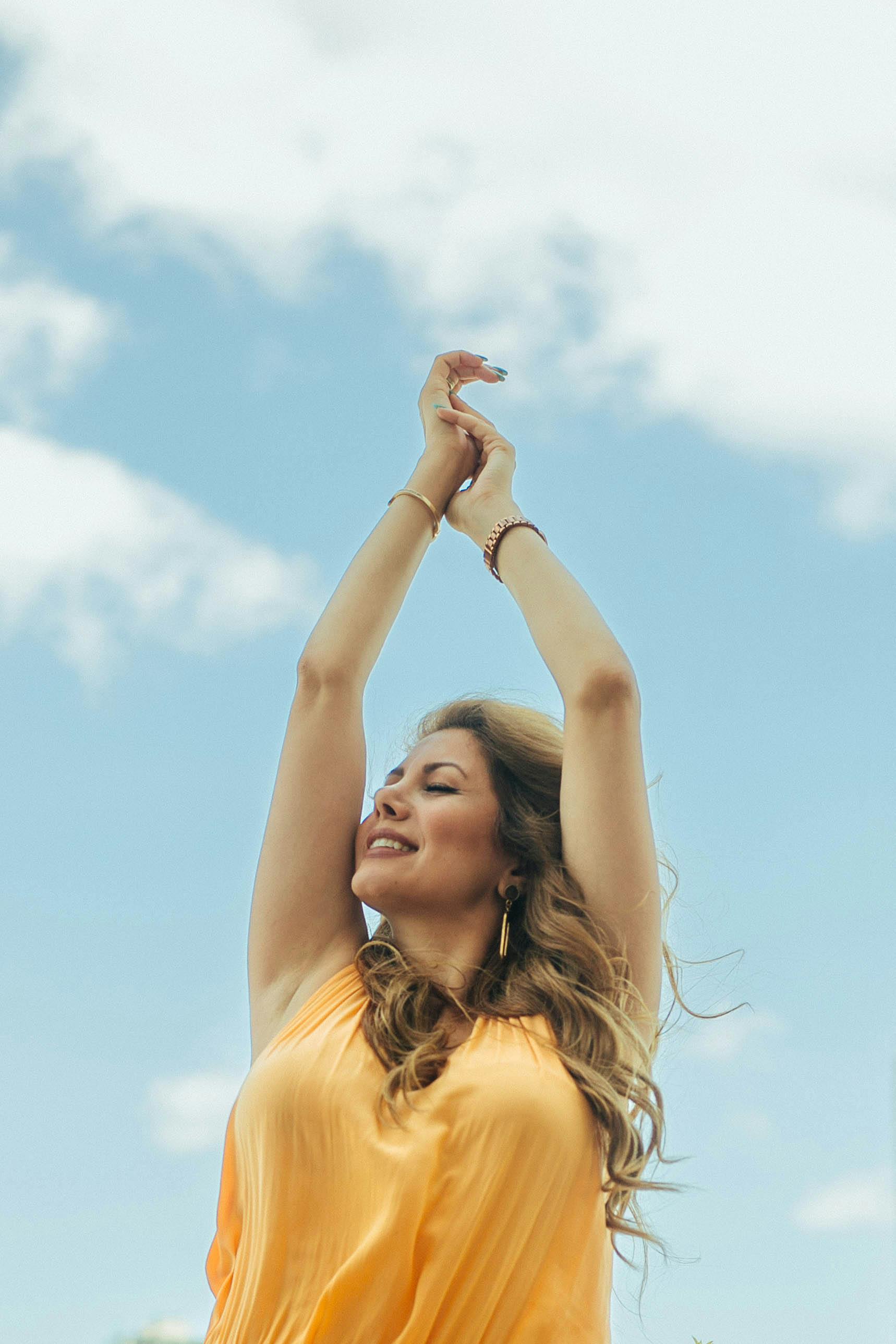 Woman sitting on floor processing grief and healing after divorce